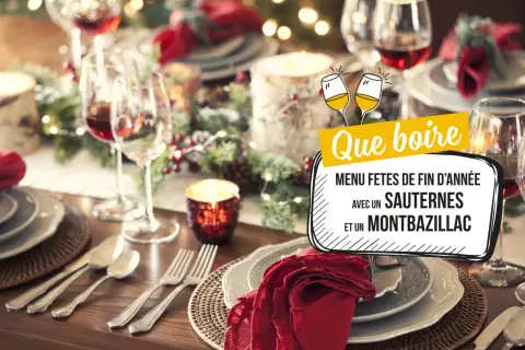 Table de fête dressée pour les fêtes de fin d'année. Que manger avec du Sauternes ? Le menu suggère ce vin avec du Montbazillac.
